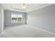 Spacious main bedroom with neutral tones and large windows for ample natural light at 1144 Clearspring Dr, Charleston, SC 29412
