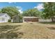 Home boasts a large fenced-in backyard with an outdoor seating area and fire pit at 1172 Dawn Dr, Charleston, SC 29412
