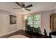 Bedroom/Office with refinished dark wood floors, a ceiling fan, and plenty of natural light at 1172 Dawn Dr, Charleston, SC 29412