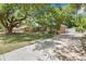 Beautiful brick home with a long driveway, mature trees, and well-maintained landscaping, showcasing classic charm at 1172 Dawn Dr, Charleston, SC 29412