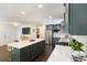 Open-concept kitchen with a large island, stainless steel appliances, and an airy feel for easy entertaining at 1172 Dawn Dr, Charleston, SC 29412