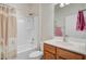 Bathroom features a shower-tub combo with shower curtain, toilet, and vanity with mirror at 118 Billowing Sails St, Summerville, SC 29486