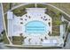 An aerial view of the stunning pool with lounge areas and tropical landscaping at 1226 Spotflower St, Summerville, SC 29485