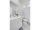 Bright bathroom featuring white cabinets and bath fixtures, and blue accents and hardware at 1226 Spotflower St, Summerville, SC 29485