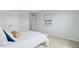 Bedroom with white linens, neutral decor, and natural light at 1226 Spotflower St, Summerville, SC 29485