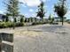 Outdoor horseshoe pit surrounded by trees and landscaping in a recreational community space at 1226 Spotflower St, Summerville, SC 29485