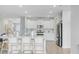 Bright kitchen with white cabinets, stainless steel appliances, and a spacious layout at 1226 Spotflower St, Summerville, SC 29485