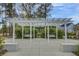 Shady pergola with inviting swing benches, providing a relaxing spot to enjoy the outdoors at 1226 Spotflower St, Summerville, SC 29485