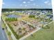 A picturesque neighborhood view with a playground and pond at 1226 Spotflower St, Summerville, SC 29485