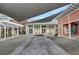 Vibrant town center featuring a community table, a variety of businesses and a covered outdoor space at 1226 Spotflower St, Summerville, SC 29485