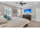 Inviting bedroom with a comfortable bed, coastal-themed decor, and ample natural light at 1245 Saddlehorn Rd, Summerville, SC 29486