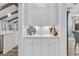 Elegant built-in hutch with white cabinets and countertop, offering stylish storage and display space at 1245 Saddlehorn Rd, Summerville, SC 29486