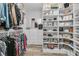 Spacious walk-in closet with custom shelving and storage for shoes, handbags and clothes at 1245 Saddlehorn Rd, Summerville, SC 29486
