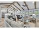 Bright, open living area showcasing vaulted ceilings with wooden beams and an open layout at 1245 Saddlehorn Rd, Summerville, SC 29486