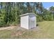 Image of a storage outbuilding with double doors and gravel base at 1245 Saddlehorn Rd, Summerville, SC 29486