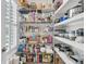 Organized pantry with wire shelving for ample storage, stocked with food items and kitchen appliances at 1245 Saddlehorn Rd, Summerville, SC 29486