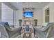 Cozy outdoor patio featuring a stone fireplace and comfortable seating at 1245 Saddlehorn Rd, Summerville, SC 29486