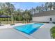 Backyard pool area featuring a modern pool design and stylish outdoor furniture at 1245 Saddlehorn Rd, Summerville, SC 29486