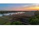 Stunning aerial view of marsh with docks and walkways at sunset at 13 Broughton Rd, Charleston, SC 29407