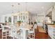 Well-equipped kitchen with modern appliances, a central island, and elegant finishes at 13 Broughton Rd, Charleston, SC 29407