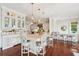 Spacious kitchen featuring custom cabinets, a center island, and ample counter space at 13 Broughton Rd, Charleston, SC 29407