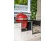 Outdoor kitchen with grill and granite counters at 13 Broughton Rd, Charleston, SC 29407