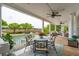 Expansive porch with dining and seating areas, ideal for entertaining or enjoying peaceful moments at 13 Broughton Rd, Charleston, SC 29407