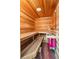 Relaxing cedar sauna features wooden benches and bucket at 13 Broughton Rd, Charleston, SC 29407
