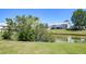 Backyard view of townhomes along a pond at 132 Lynches River Dr, Summerville, SC 29485