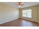 Bright bedroom with hardwood floors, ceiling fan, and natural light from a window at 132 Lynches River Dr, Summerville, SC 29485