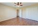 Bedroom featuring hardwood floors, ceiling fan and double-door closet at 132 Lynches River Dr, Summerville, SC 29485