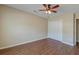 Spacious bedroom with hardwood floors, closet, and a modern ceiling fan at 132 Lynches River Dr, Summerville, SC 29485