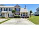 Attractive townhouse showcasing a neat front lawn and well-kept landscaping at 132 Lynches River Dr, Summerville, SC 29485