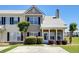Charming townhome featuring neutral siding, black shutters, and well-maintained landscaping at 132 Lynches River Dr, Summerville, SC 29485