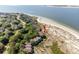 Aerial view of oceanfront condos offering beach access, with lush foliage and scenic surroundings at 1332 Pelican Watch Villas, Seabrook Island, SC 29455