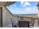 Outdoor seating area with table and chairs, perfect for enjoying the water view at 1332 Pelican Watch Villas, Seabrook Island, SC 29455
