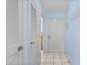 Bright hallway with white tile floors and access to multiple rooms at 1332 Pelican Watch Villas, Seabrook Island, SC 29455