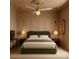 A serene bedroom featuring a cozy bed and a modern ceiling fan at 134 Spring St, Charleston, SC 29403