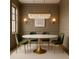 Stylish dining room with a marble table and modern chandelier at 134 Spring St, Charleston, SC 29403