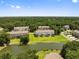 Aerial view of community featuring a pond, extensive green space, and multiple townhome buildings at 1349 Hamlin Park Cir, Mount Pleasant, SC 29466
