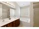 Bright bathroom with double vanity, soaking tub, and tile flooring at 1349 Hamlin Park Cir, Mount Pleasant, SC 29466