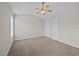 This carpeted bedroom includes a ceiling fan and double door closet for optimal space at 1349 Hamlin Park Cir, Mount Pleasant, SC 29466