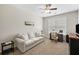 Comfortable bedroom with neutral carpet, a window for natural light, and space for a desk or seating area at 1349 Hamlin Park Cir, Mount Pleasant, SC 29466