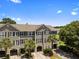 Beautiful townhome community featuring well-maintained landscaping, garage parking, and traditional architecture at 1349 Hamlin Park Cir, Mount Pleasant, SC 29466