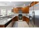 Well-equipped kitchen features stainless steel appliances, granite countertops, and ample cabinet space at 1349 Hamlin Park Cir, Mount Pleasant, SC 29466