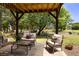 Beautiful outdoor patio area with peaceful backyard lake view at 1349 Hamlin Park Cir, Mount Pleasant, SC 29466