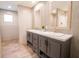 Modern bathroom with double vanity, sleek fixtures, and contemporary tile accents at 1358 Givhans Rd, Ridgeville, SC 29472