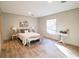 Bright bedroom with natural light and a comfortable bed; complemented by stylish decor at 1358 Givhans Rd, Ridgeville, SC 29472