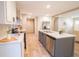 Spacious kitchen featuring modern finishes, a central island, and stainless steel appliances for the home chef at 1358 Givhans Rd, Ridgeville, SC 29472