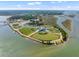 An aerial view of baseball fields surrounded by the river and lush greenery at 137 Low Tide Ct, Charleston, SC 29492